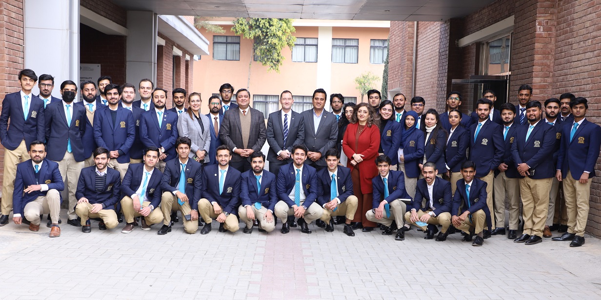 Simon Cleaver (CTH Director of Partnerships) and Asad Warraich (CTH Country Representative - Pakistan) pictured alongside the faculty and students of Hashoo School of Hospitality Management (HSHM).